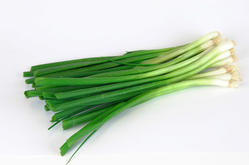 Obraz na płótnie Canvas fresh bunch green onion on white background