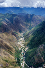 Urubamba river flowing through green Andes, Machu Picchu, Cusco Region, Urubamba Province, Machupicchu District, Peru