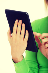 Woman using a tablet.