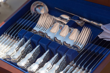 Silver spoons with forks for sale at flea market