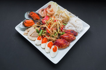 papaya salad with egg and chicken and vegetable
