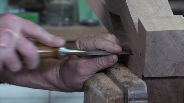 carpenter working in his workshop