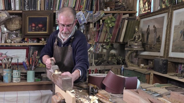 carpenter working in his workshop
