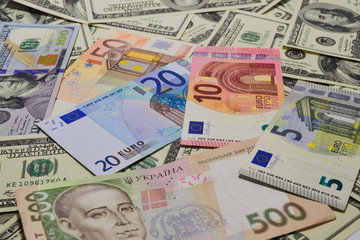 Much money. Many banknotes. Dollar, euro, hryvnia