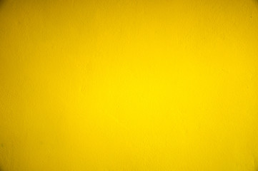 Concrete wall yellow color for texture background