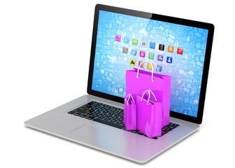 laptop and  shopping pags on white background
