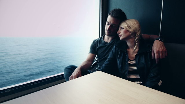 Motion-Photo (Cinemagraph) of Young Couple Sleeping on a Ferry Boat