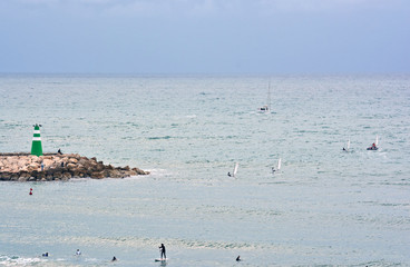 surfing and kiting in sredizenom sea off Tel Aviv