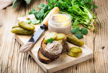 Homemade chicken liver pate  on rustic wooden table