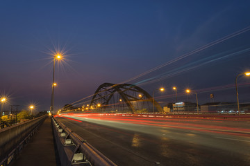 Fototapeta na wymiar Speed lines on the bridge in city.