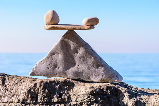 Zen stones in balance on coast