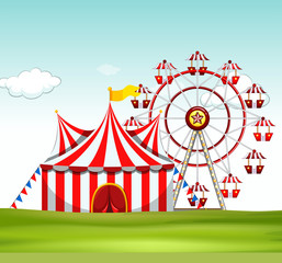 Circus tent and ferris wheel on the ground