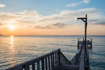 Bridge and pavillion on the sea with people walk on the bridge
