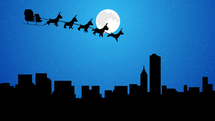 Santa flying over city on sleigh with reindeer