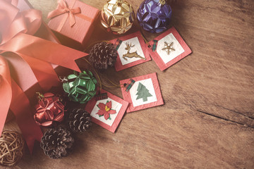 Red gift box on wooden background, Christmas concept