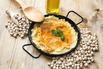 Homemade hummus with garlic and onions paprika