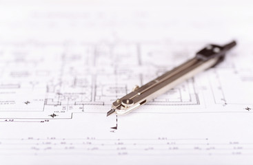 Pair of compasses on plan