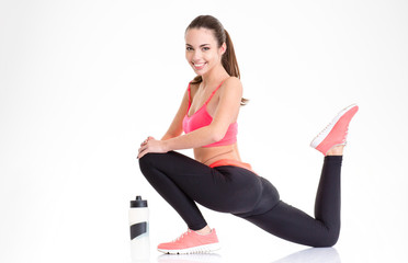 Fototapeta premium Attractive cheerful fitness woman working out