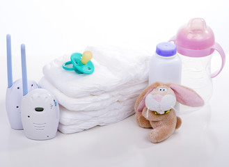baby monitor, diapers. pacifier nipple. Toy hare banny , bottle - safety and care of the baby