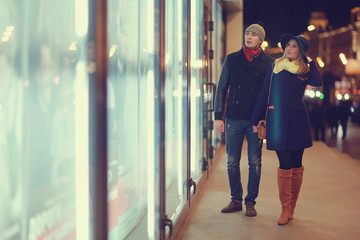 Obraz premium couple winter sale young man and woman