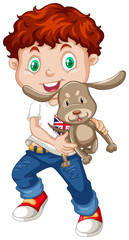 Little boy holding a puppy