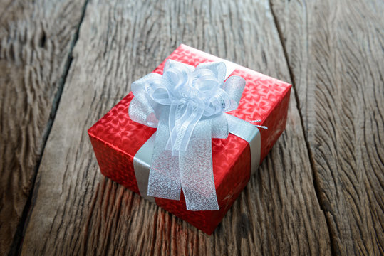 Packed glittery red present container