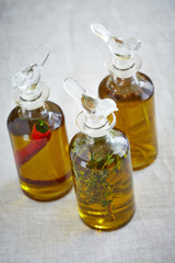 three bottles of olive oil