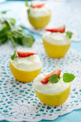 creamy dessert served in lemon halves