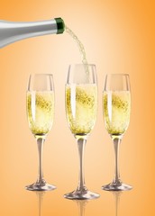Champagne pouring against orange vignette