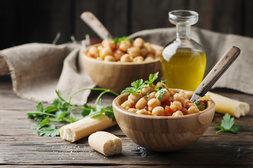 Vegeterian cooked chickpea with tomato and parsley