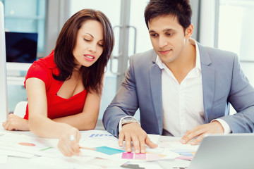 Fototapeta premium Two young business collegue in office