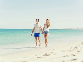 Romantic young couple on the beach