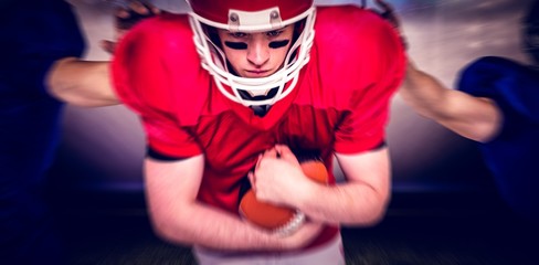 Fototapeta premium Composite image of american football players