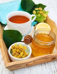 cup of herbal tea with linden flowers