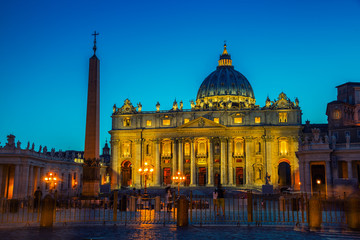 Fototapeta na wymiar Illuminated St. Peters Basilica in Vatican City