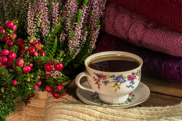 Obraz na płótnie Canvas Sweaters and a cup of coffee