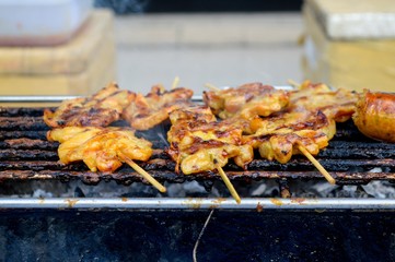  roasted pork on a grill stove in Thailand