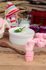 Heart pink marshmallow sweet with yogurt delicious.