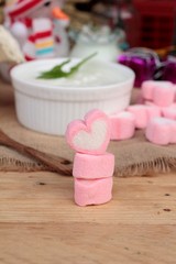 Heart pink marshmallow sweet with yogurt delicious.