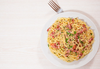 capellini pasta and sauce with bacon