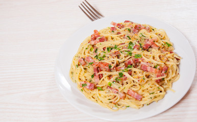 capellini pasta and sauce with bacon