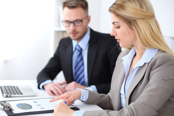 Fototapeta premium Two successful business partners working at meeting in office