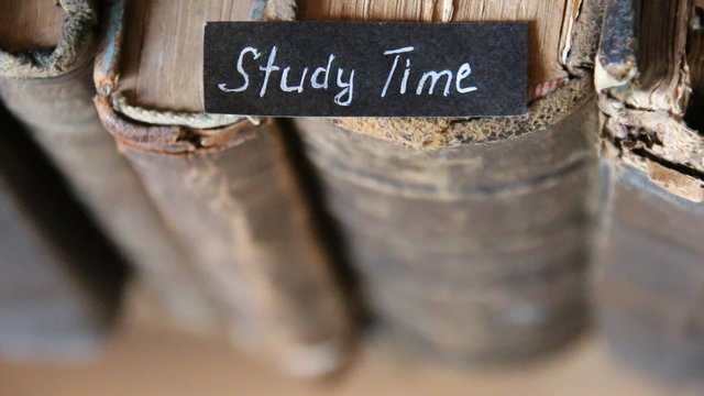 Study Time idea, inscription on the label "Study Time " and old books