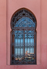 Fototapeta na wymiar Traditional window with reflection, Marrakesh, Morocco