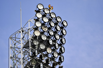 Naklejka premium Broken spotlight on sports arena floodlights