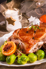Christmas dinner with brussels sprouts in orange sauce