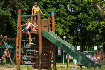 Fototapeta na wymiar kids on the playground, happy children