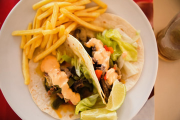 pita gyros with meat, fried potatoes