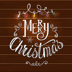 Merry Christmas Card with lettering on wooden background. Vector