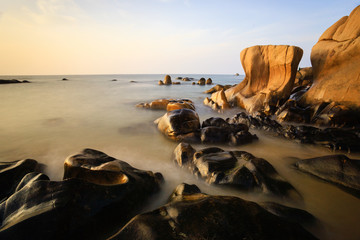 Co Thach beach is like an art masterpiece that nature grants to Tuy Phong, Binh Thuan, Vietnam. Co Thach is a new destination for photographer with thousand-years-stones covered in green seaweed.